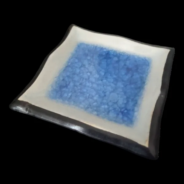 Cendrier artisanal en céramique bleue craquelée