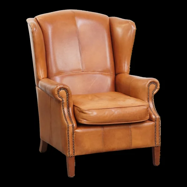 Fauteuil à oreilles en cuir de vache