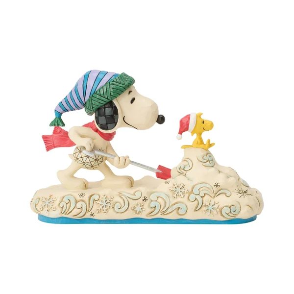 Figurine Snoopy déneigeant - Peanuts by Jim Shore