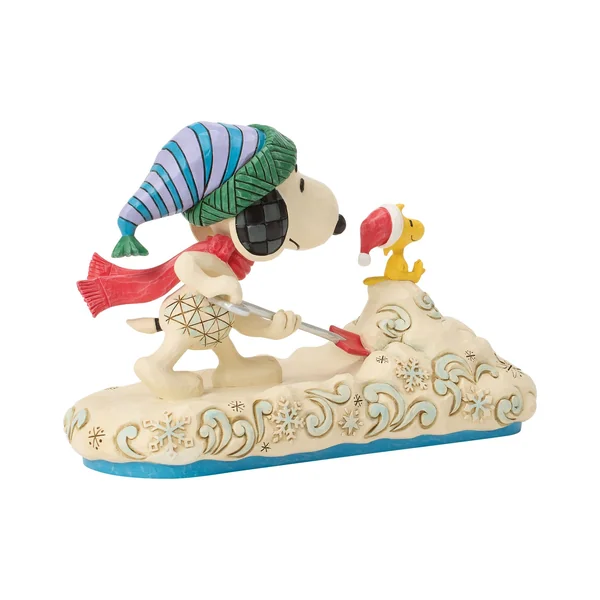 Figurine Snoopy déneigeant - Peanuts by Jim Shore