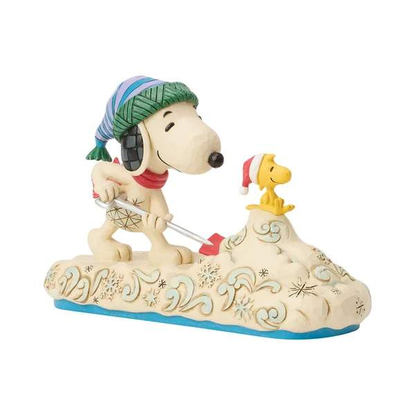 Figurine Snoopy déneigeant - Peanuts by Jim Shore