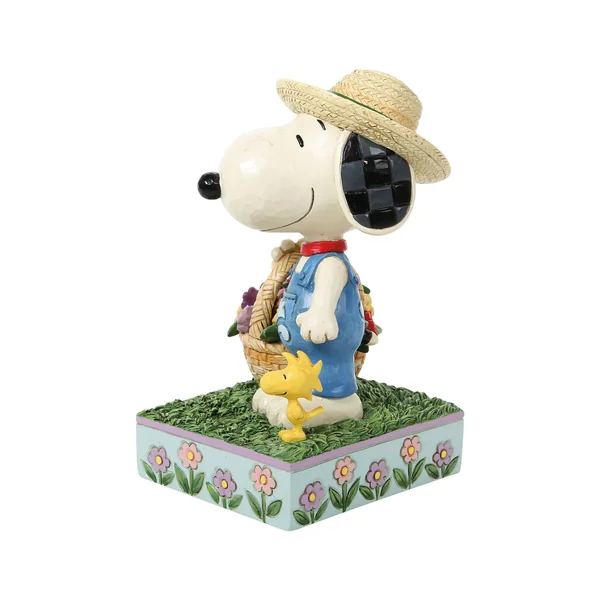 Figurine Snoopy tenant un panier de fleurs - Peanuts by Jim Shore